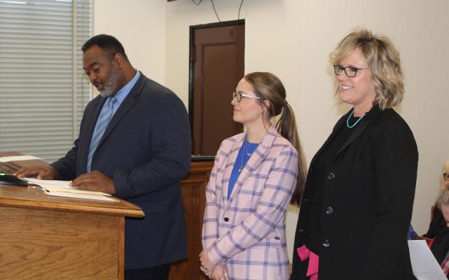 Texas A&amp;M AgriLife Extension Service District Administrator Dr. Hurley Miller introduced Amy Smith-Shively (right) and Allison Morrow as the newest members of the VZC Agrilife Extension office Feb. 15 during the regular meeting of the VZC Commissioners Court. Photo by David Barber