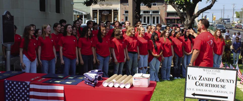 The Van High School Choir, under the direction of Gage Rice, led in the singing of ‘The Star-Spangled Banner’ and ‘America the Beautiful’ during the Constitution Day Observance program held on the northside steps of the Van Zandt County Courthouse Sept. 17. The event was sponsored by the Republican Club of VZC. Photo by David Barber