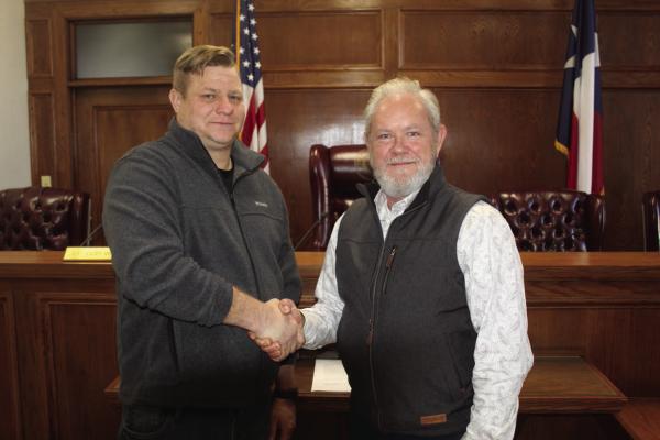 Kevin Palmer (left) was introduced as the new full-time Van Zandt County Fire Marshal Jan. 3 by VZC Pct. 2 Commissioner Cliff Williams. Palmer will officially begin his full-time duties on Jan. 22 even though he is already working part-time in the position. Palmer comes to VZC from the Gladewater Fire Department where he served as captain and fire marshal. Photo by David Barber