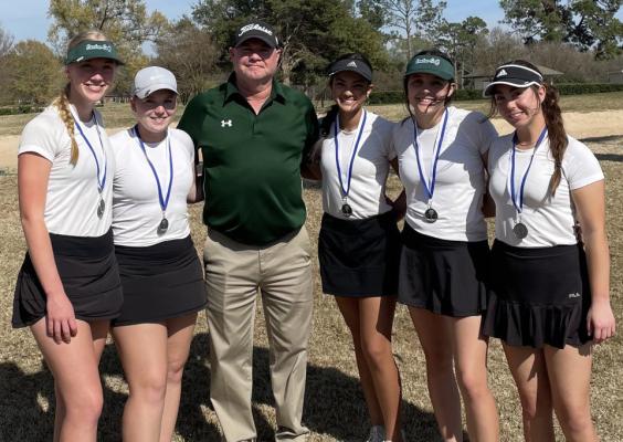 Golf team finishes second at district