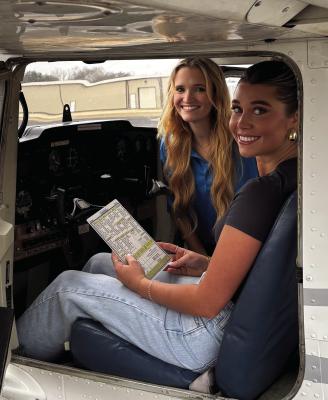 Molly Earnhardt, a certified flight instructor, prepares to give a flying lesson at the Van Zandt County Regional Airport in Wills Point to Bailey Dykes, a private pilot student. Courtesy photo