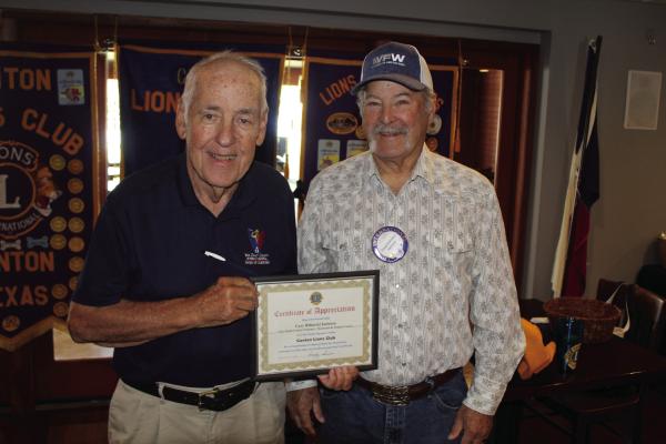 Following his presentation Sept. 10, Van Zandt County Veterans Memorial Board of Directors Chairman Cary Hilliard, left, was presented with a ‘Certificate of Appreciation’ by Canton Lions Club First Vice-President Doug Harrison. Hilliard spoke during the club’s weekly luncheon at the Van Zandt Country Club. Photo by David Barber