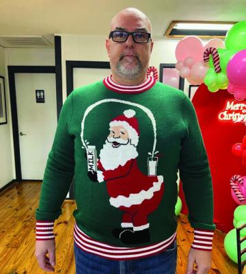 Rob Rhyne with Rob Rhyne Law L.L.C. was the winner of the ‘Ugly Christmas Sweater’ contest during the Canton Texas Chamber of Commerce Member Appreciation event Dec. 1 at Firegrounds Coffee Shop in Canton. Courtesy photo