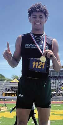 Chantson Prox’s long jump attempt of 22-09 earned him firstplace at the Regional Track Meet. Courtesy photo