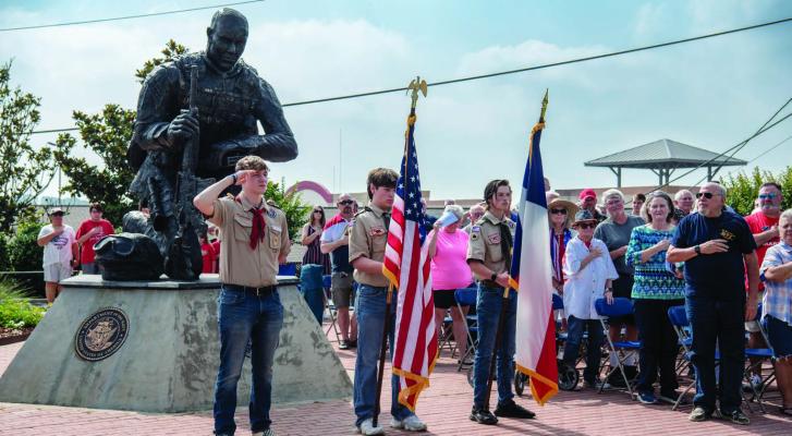 Members of Boy Scout Troop 378 presented the colors to open the annual Memorial Day program May 27 at the Van Zandt County Veterans Memorial in Canton. Photos by Faith Caughron