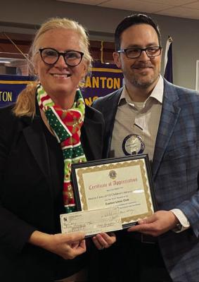 A ‘Certificate of Appreciation’ was presented to Sharyn Casey of the Van Zandt County Children’s Advocacy following her guest appearance Dec. 4 during the weekly Canton Lions Club Luncheon at Van Zandt Country Club. Presenting the certificate was Canton Lions Club President Jonathan Helvey. Photo by Susan Harris