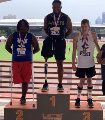Jaxson Hubble, far right, capped his freshman season by placing third overall in the seated shot put at the Class 4A State Track and Field Meet at Myers Stadium in Austin. Courtesy photo