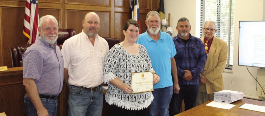 Van Zandt County Commissioners Court Administrator Keegan Caldwell was recognized for her five years of service in VZC by members of the commissioners’ court. Shown with Caldwell were left to right; VZC Pct. 2 Commissioner Cliff Williams, VZC Pct. 4 Commissioner Brandon Barton, VZC Pct. 3 Commissioner Bobby Phillips, VZC Pct. 1 Commissioner Mitch Curtis, and VZC Judge Andy Reese. Photo by David Barber