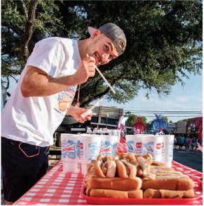 Canton’s annual Fourth of July Celebration, sponsored by the Chamber of Commerce, included a hot dog eating contest. Joel Hansen would take the overall title for the third consecutive year during the event, finishing with 40 hot dogs eaten during the 10-minute contest. Photo by Faith Caughron