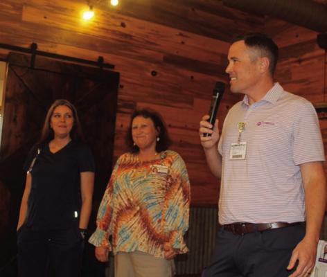 Christus Health Clinical Director of the Canton and Athens Emergency Care Center Heather Haimes BSN RN, far left, and Sheryl Morris of the Canton Emergency Care Center were introduced by Christus Health Program Manager/Business Development/Strategic Planning Director Drew Boring. They were recognized during the Canton Texas Chamber of Commerce Quarterly Luncheon Feb. 4 at The Silver Spur Resort.