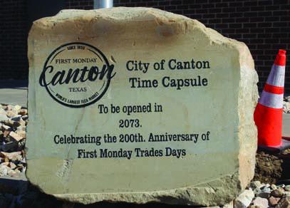 The City of Canton held a Time Capsule burial ceremony July 4 in front of Canton City Hall. A container full of various city-related artifacts was buried July 4 and will not be brought back up until the year 2073. Photo by Susan Harris