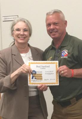 Canton Mayor Lou Ann Everett presented Bud Sanford with a certificate for being voted BEST Firefighter in the 2022 VZC Readers’ Choice Awards.