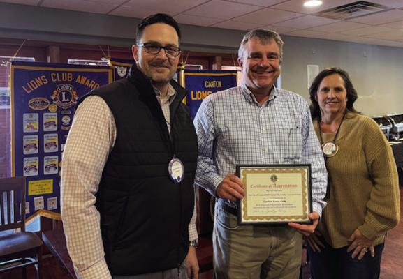 Canton Assistant City Manager Steve Ruppenthal, middle, was the guest speaker Jan. 22 at the weekly Canton Lions Club Luncheon at Van Zandt Country Club. Following his presentation, Ruppenthal received a ‘Certificate of Appreciation’ from Canton Lions Club President Jonathan Helvey and Canton Lions Club Member Teri Pruitt. Courtesy photo