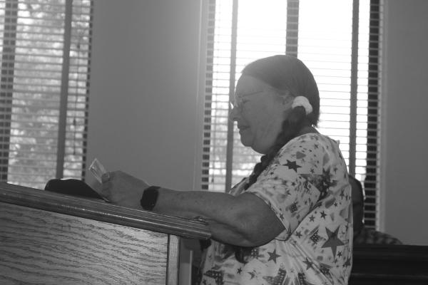 Carrie Woolverton from the Van Zandt County Genealogical Library read the proclamation declaring that the week of June 11 be designated as ‘Flag Week’ in VZC and Wednesday, June 14 be declared as ‘Flag Day’ in VZC. The proclamation received approval from the VZC Commissioners Court during its regular meeting June 7. Photo by David Barber