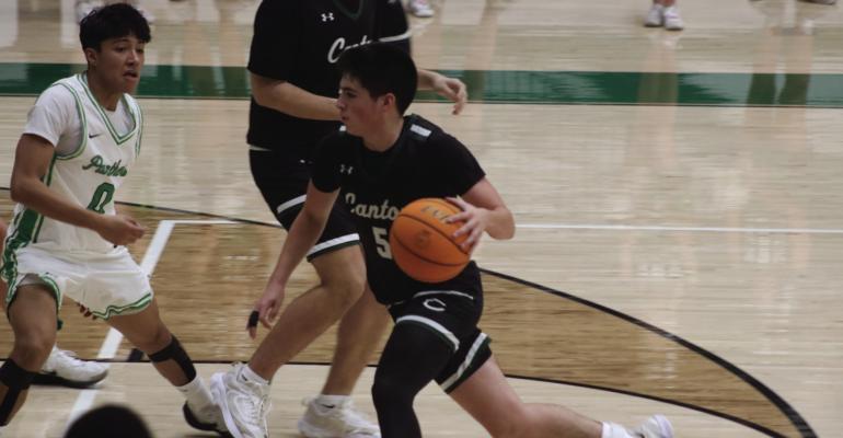 Keegan Smalling of the Canton Eagles dribbles the ball in the Jan. 2 district opening game between the Eagles and the Mabank Panthers in Mabank. The Panthers outlasted the Eagles, 44-31. The Eagles hosted their Van Zandt County rival, the Van Vandals, Jan. 6. Photo by Russell Slaton