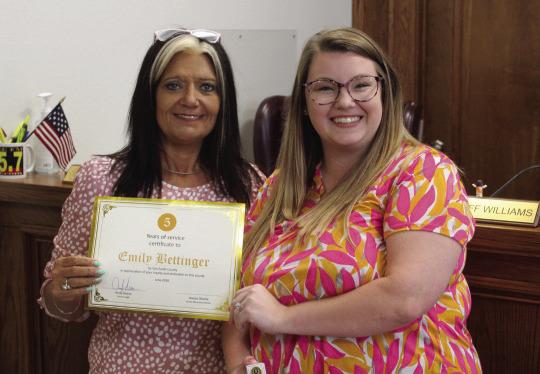 Van Zandt County Human Resources Coordinator Emily Bettinger, right, was recognized for her five years of service by VZC Human Resources Director Jessica Deville. Bettinger was recognized during the regular meeting of the VZC Commissioners’ Court June 3. Photos by David Barber