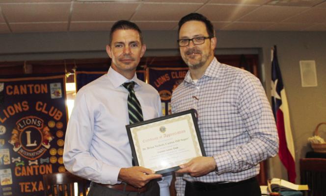 Canton ISD Superintendent Brian Nichols, left, was presented a ‘Certificate of Appreciation’ June 4 following his presentation to the Canton Lions Club during its weekly luncheon at The Bunker located at the Van Zandt Country Club. Presenting the certificate was Canton Lions Club President Jonathan Helvey. Photo by Susan Harris