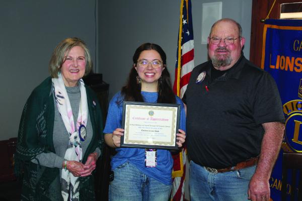 Following her presentation on Feb. 25 at the Canton Lions Club Luncheon held at the Van Zandt Country Club, Van Zandt County/Sarah Norman Library Youth Services Coordinator Jordan Shilling, middle, was presented a ‘Certificate of Appreciation’ by Canton Lions Club President Sandy Sims and Canton Lions Club Member Sandra Giles. Photo by David Barber