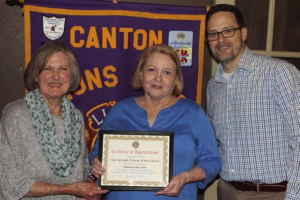 A ‘Certificate of Appreciation’ was presented to Van Zandt County Friends of the Library President Ann Spruiell, middle, following her guest speaking appearance March 26 at the weekly Canton Lions Club Luncheon held at Ole’ West Bean and Burger. Standing with Spruiell were Canton Lions Club President Jonathan Helvey and Canton Lions Club Member Sandra Giles Photo by David Barber