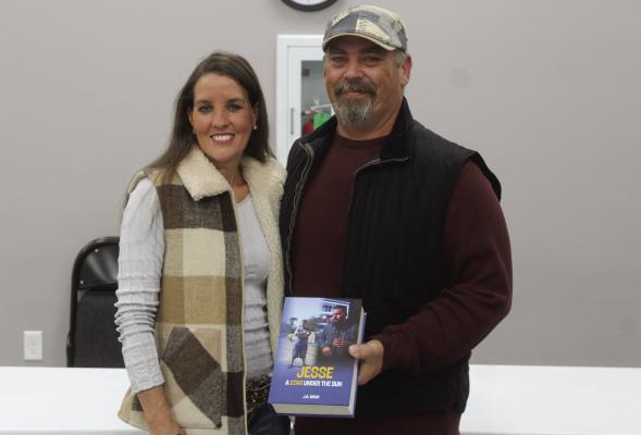 J. A. Wray recently announced the release of his debut novel, ‘ Jesse: A Star Under the Sun.’ The book invites readers into the wildlife of an imaginative character who navigates the trials and tribulations of growing up. Standing with Wray is his wife, Christy, who played a pivotal role in his writing journey. Photo by Bodey Cooper