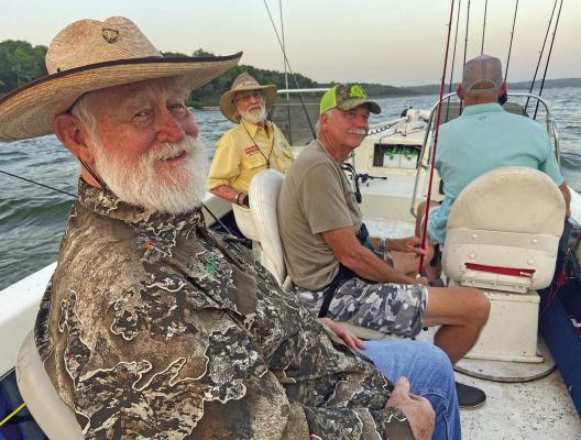Luke and some great friends, Larry Weishuhn aka. “Mr. Whitetail in foreground, Bill Carey, Jeff Rice and our guide Todd Mehalko enjoyed some great striper fishing last week at Lake Texoma with Striper Express. Photo by Luke Clayton