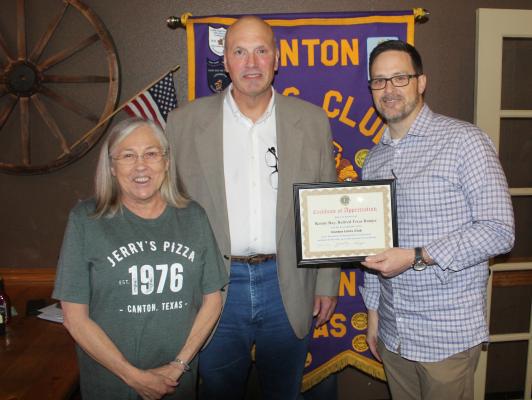 Kenny Ray, middle, was presented with a ‘Certificate of Appreciation’ March 19 as he served as the guest speaker during the weekly Canton Lions Club Luncheon which was held at a new temporary location, Bean and Burger in Canton. Presenting Ray with the certificate were Canton Lions Club President Jonathan Helvey and Canton Lions Club Treasurer Mauricia Sims. Photos by David Barber