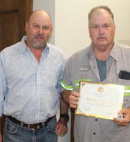 Van Zandt County Pct. 4 Employee Wendall Haynes (right) was recognized for his 10 years of service in VZC during the regular meeting of the VZC Commissioners Court April 23. VZC Pct. 4 Commissioner Brandon Barton presented Haynes with a ‘Certificate of Appreciation.’