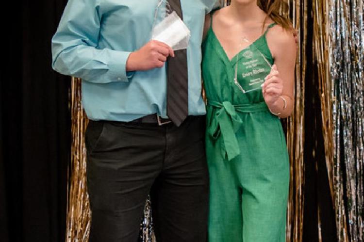 Young Woman of the Year Emory Rhoten, right, and Young Man of the Year Preston Yarber.