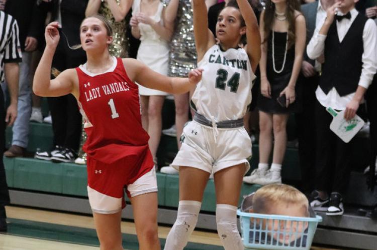 Amari Welch attempts a three-pointer in the final minutes of regulation during Canton’s 45-42 loss to Van on Friday night. Photo by Lianna Reid