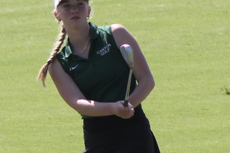 Taryn Clayton carded a twoday total of 179 at Legends Golf Course May 16-17. Clayton and her teammates would go on to finish eighth overall at the Class 4A State Tournament. Caroline Stern looks on as she hits a short chip onto the green during play at the Class 4A State Golf Tournament at Legends Golf Course. Courtesy photos