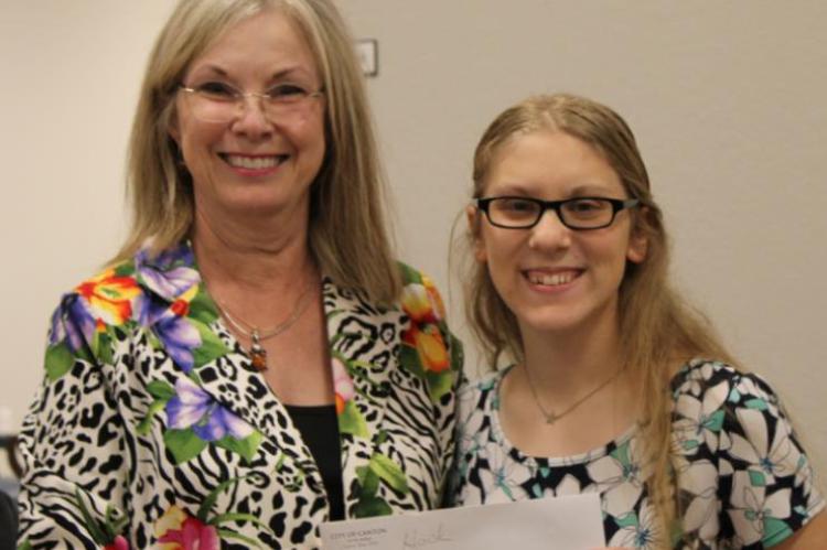 Canton Mayor Lou Ann Everett presented Catherine Hooks and Raeleigh Strickland (not pictured) with the Sanitation Solutions scholarships. Photo by Britne Hammons