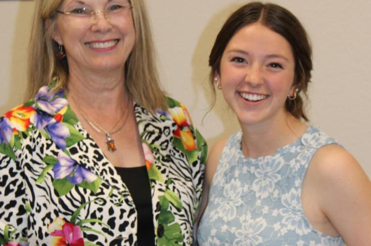Canton Mayor Lou Ann Everett presented Avery Nicks with the Rayford Hutcherson scholarship.