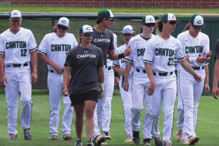 The Canton Eagles make their way across the field prior to play against the visiting Edgewood Bulldogs. Canton would come up just short in the matchup, falling by a 4-1 score. Photo by Lianna Reid gainst the visiting