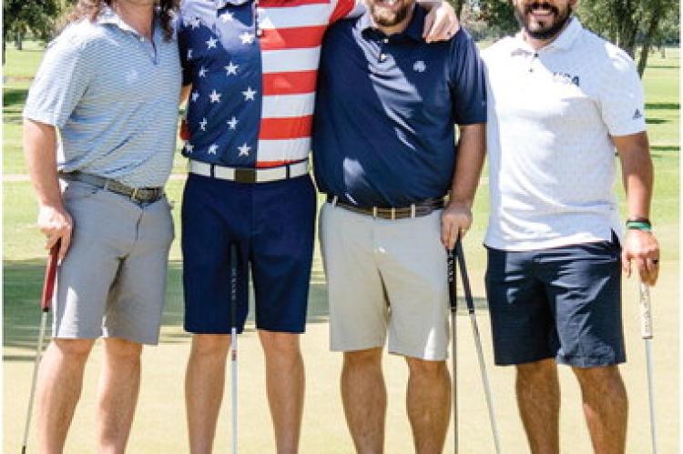 Thomas Beckham, Craig Trevino, Craig Goff and Beau Williams carded a 54 to win first overall at the annual Veterans Memorial Golf Tournament. Photo by Faith Caughron
