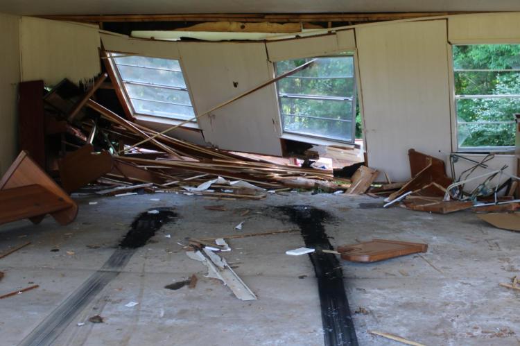 The inside of the chapel, with visible tire marks.