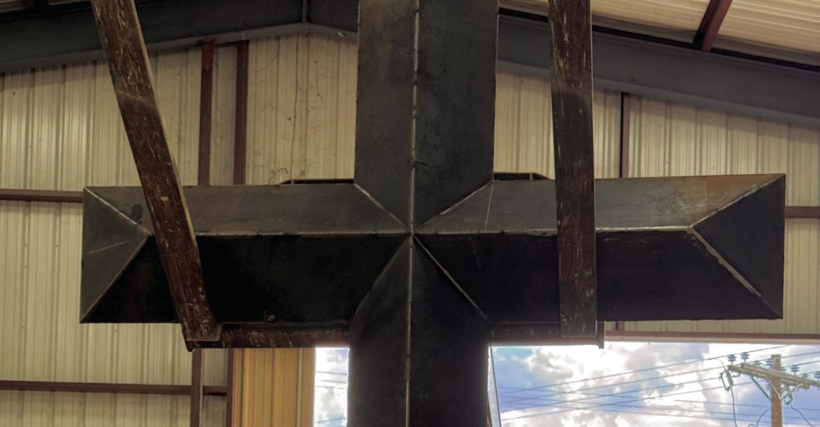 David Broussard is hard at work on his “River of Angels Cross” project. The one-ton steel cross will be accompanied by 119 angels to honor the lives lost in the Texas Hill Country flood last year. Photos by David Broussard
